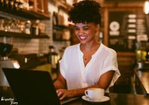 Top 10 Web Design Companies in Botswana: Botswana entrepreneur analyzing and choosing the best Web Design Company in Botswana on a laptop