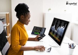 Botswana entrepreneur analyzing market data on a laptop: The 19 Types of Digital Marketing (Explained for Botswana Business Owners)